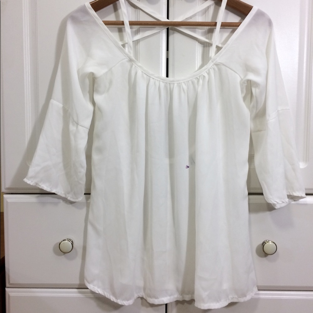White cut out back sheer flare blouse